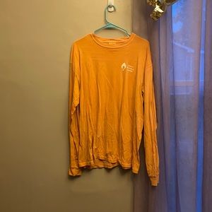 Peachy colored long sleeve shirt dance marathon